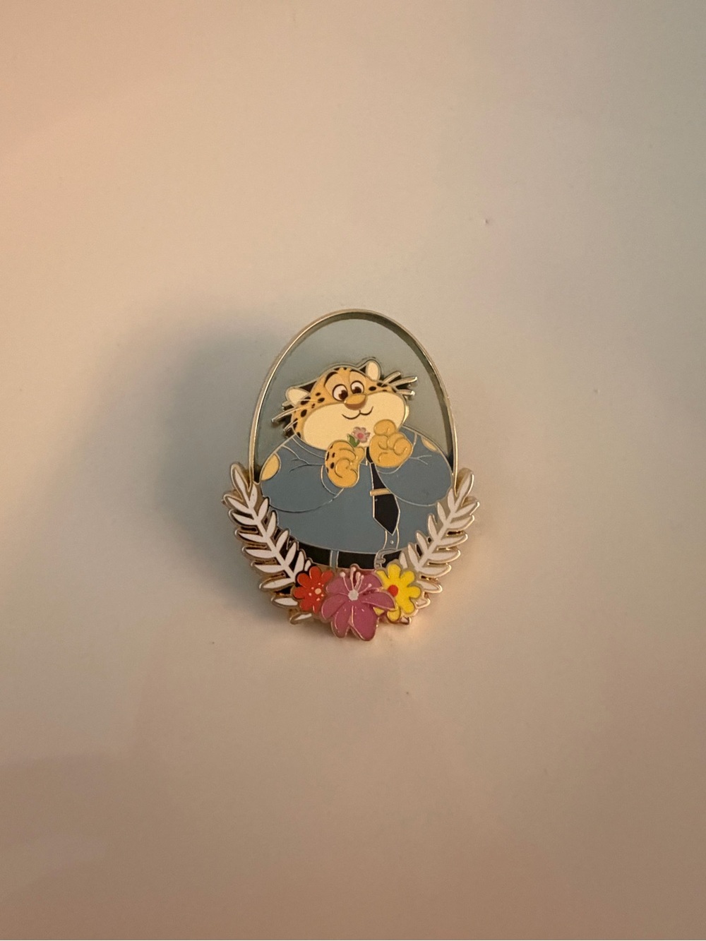 Disneys Zootopia mystery pin “Clawhauser”
